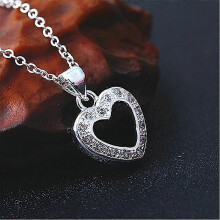 Classic and delicate silver pendant with zirconium of love
