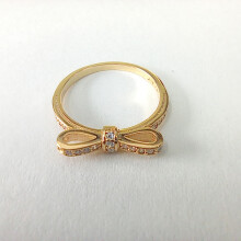 (58) Pandora Gold Delicate Bow Ring With CZ