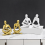 Gold Thinkers Resin Statue Reading Ornament, A 7