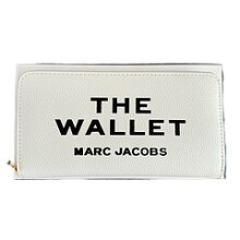 (White) Holding a wallet clip in hand