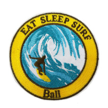 Suloinen paikka Syö Sleep Surf Bali Brodeerattu Silitysrauta Ompele paikkatarrat Indonesia Surffausmatkamuisto