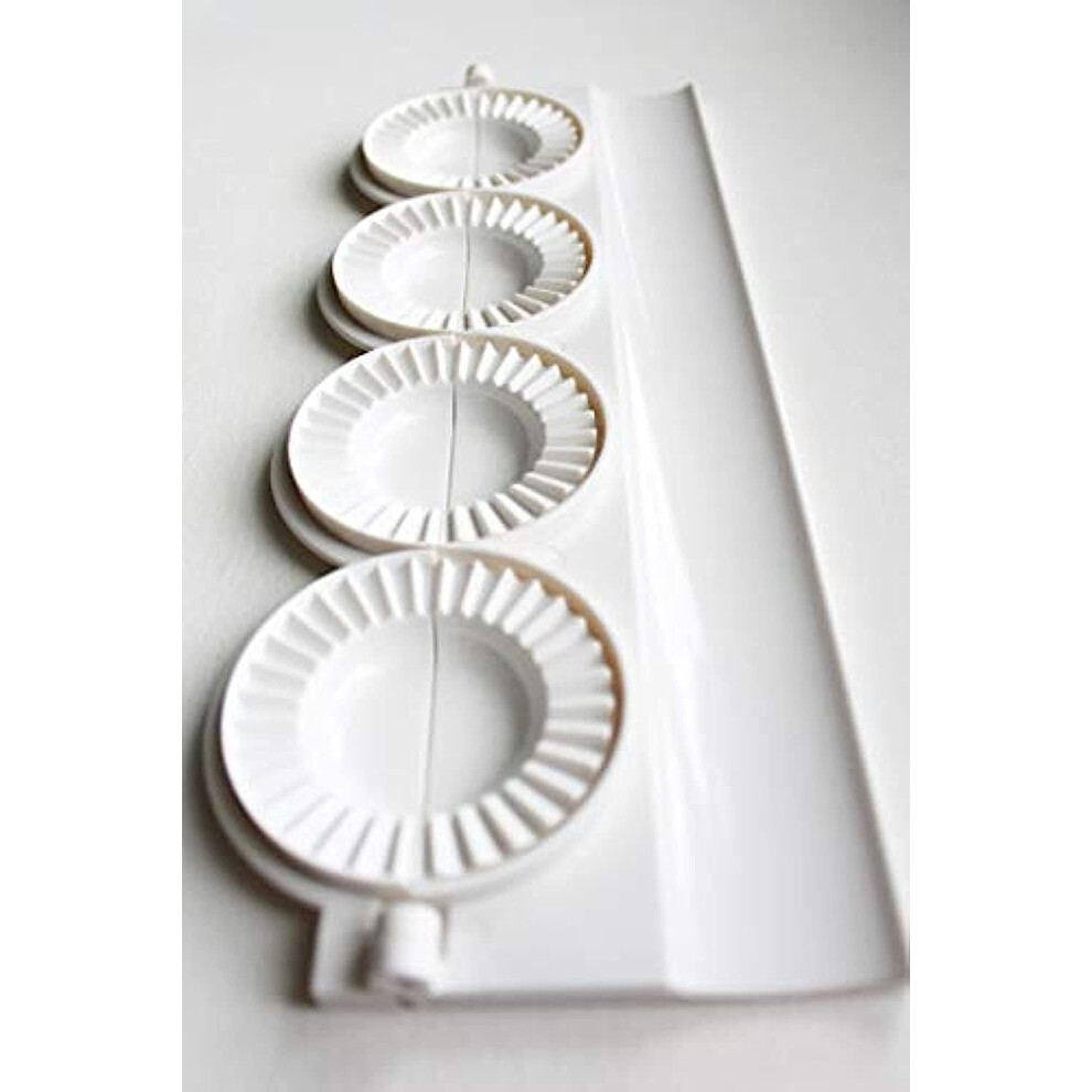 Leporinum Pierogis Peque Os Alb Ndigas Uszka Pressmaker Hace Cuatro Pierogis Peque Os A La Vez-image