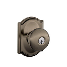 SCHLAGE F51A PLY 620 CAM Fechadura de Entrada com Botão Plymouth e Acabamento Camelot, Peltre Antigo