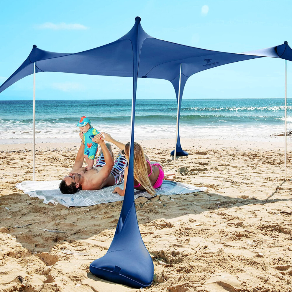 SUN NINJA Beach Tent Sun Shelter with UPF50+ Protection  Includes Sand Shovel  ground Pegs and Stability Poles  Outdoor Pop Up Beach Shade canopy for