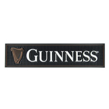 Alfombrilla de Bar Guinness Etiqueta Gáelica - PVC Negro Antideslizante (Blanco) | Mercancía Oficial Guinness