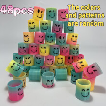 48pcs farbenfrohe Mini -Elastizierkreise mit lustigen fröhlichen Gesichtern - dehnbare, stapelbare Regenbogen -Frühlingsspielzeug für Partys