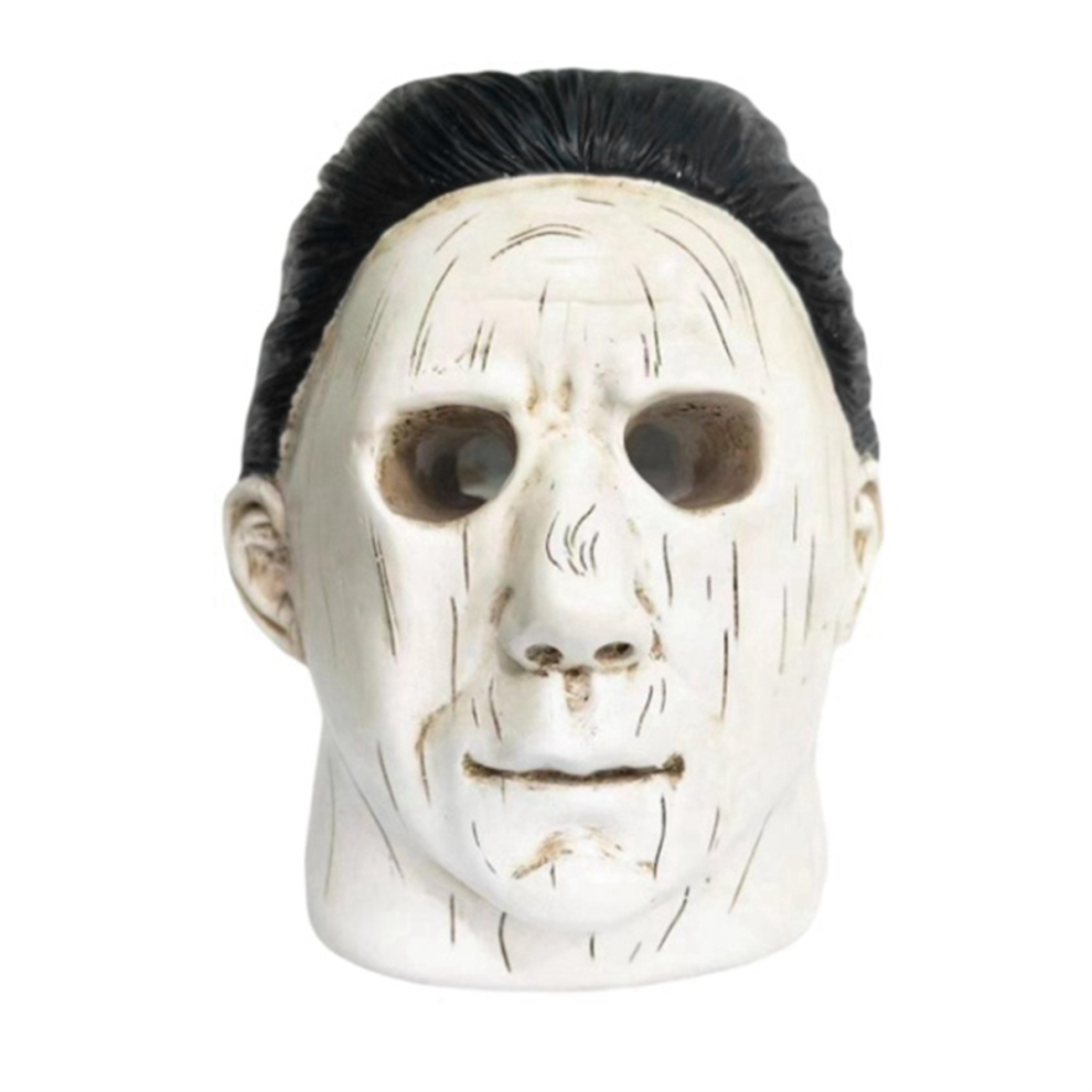 Human heads candlestick with tears and red candles