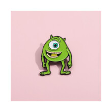 Spilla accattivante con personaggio dei cartoni animati con design di un mostro verde giocoso