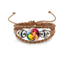 (34401304) Ruskea monikerroksinen nahkaranneke lapsille, jossa on hahmoja