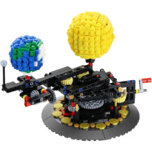 Toy building set - Earth revolving around the sun block - Rotating astronomical solar system model