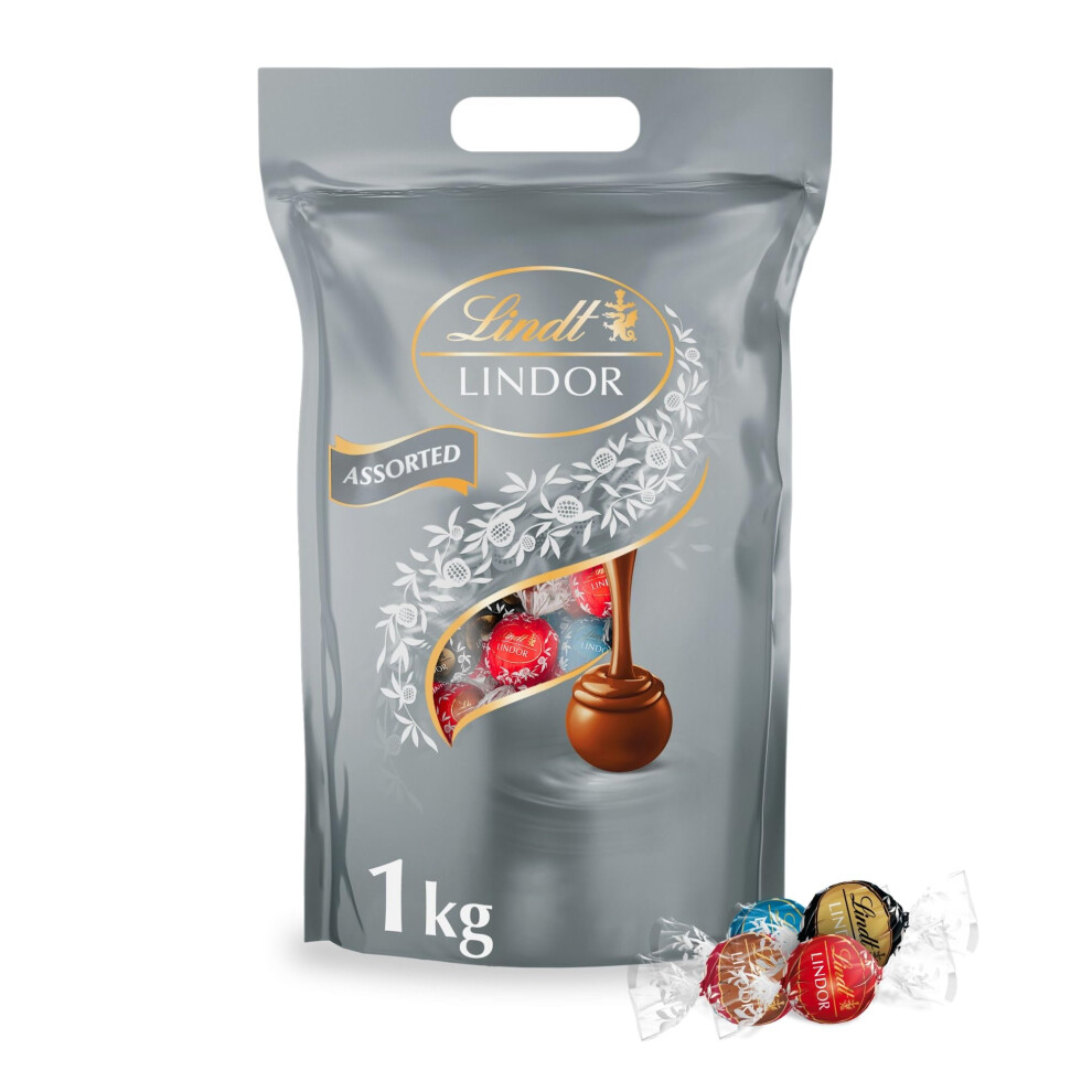 Lindt - Sachet Grand Format LINDOR - Assortiment de Chocolats au Lait, Caramel Pointe de Sel, Noir 70%, Double Chocolat - C?ur Fondant, 1 kg