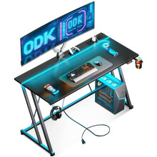 ODK Gaming Desk with LED Lights & Power Outlet, Gaming Table with Cup Holder and Headphone Hook, Double Z Frame Design Computer Desks, Carbon Fiber