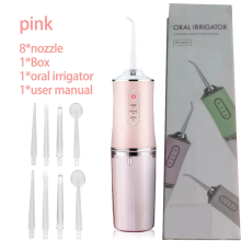 Irrigador bucal portátil rosa de 8 cabezales con caja, recargable por USB, para limpieza y blanqueamiento dental.