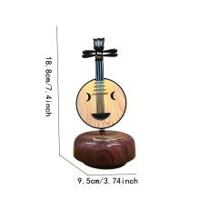 Klassische Spieluhr: Rotierende Gitarrenfigur zur Dekoration, rotierende Spieluhr von Yueqin
