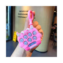 (Rose) Porte-clés Mini Monster Whackamole en caoutchouc souple, cadeau amusant pour les étudiants et les enfants,