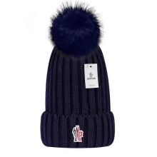 The new Versatile winter hat in wool warm wool hat knitted hat in wool ball dark blu dark blue