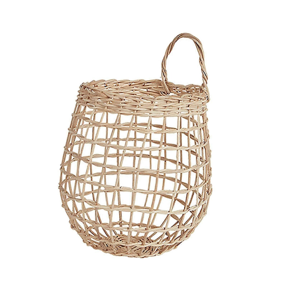 Hangende mand, fruitmand van rotan, decoratieve ui, knoflook, groentemanden voor aan de muur, display