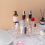 Acrylic Lifting Display Stand 3-Layer Perfume Tissue Display Stand 4