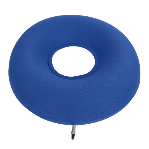 Cojín inflable azul en forma de dona para pacientes.