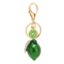 Kleiner Zitronen-Schlüsselanhänger aus Metall mit grüner Rhinestone-Frucht