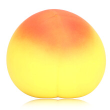 Pelota de apretar color durazno, juguete antiestrés amarillo.