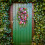 Corona de flores artificiales 60x40cm verde/rojo/amarillo 8