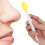 Brosse nasale en silicone souple - double face - jaune 1