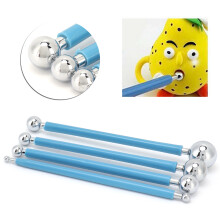 Set da 4 pezzi di strumenti in acciaio per modellare palline per torte.