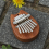 8-toons draagbaar beginnersvingerpiano-instrument D 6