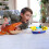 Fisher-Price Imaginext Jurassic World Rebirth Aquachomp Chase Mosasaurus Brinquedo de dinossauro de 18 polegadas com barco lanador de bonecos de 2