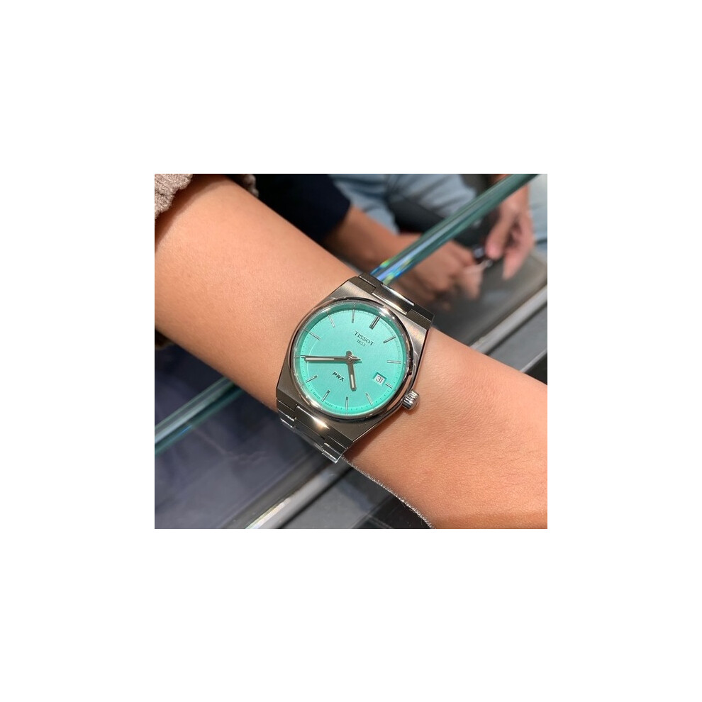 TISSOT T137.210.11.091.00 WOMENS WATCH SILVER STRAP LIGHT GREEN DIAL