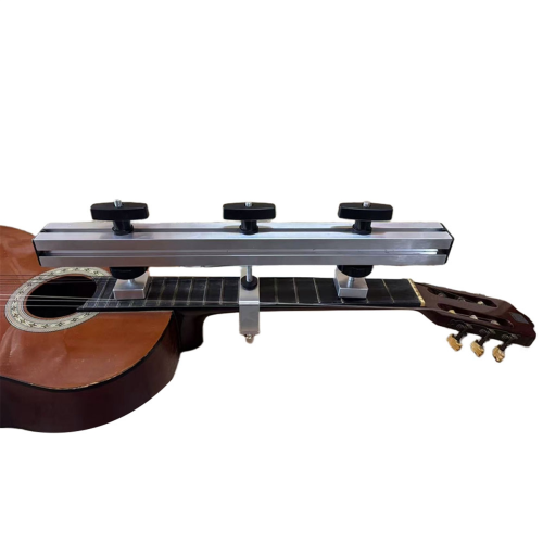 Verktyg för att korrigera deformation av gitarrhals 1