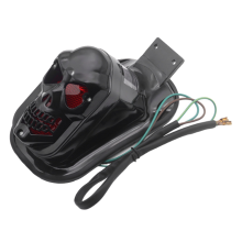 Luce posteriore a forma di teschio per moto, indicatore di direzione, luce freno, targa, coda