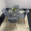 Round Glass Dining Table and 4 grey   Colour leather  Chairs 7
