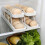 Rolling Egg Dispenser 2 Tier Space Saving Automatic Roll Down Egg Holder for Refrigerator Countertop White 4