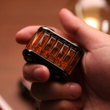 Juguete antiestrés en forma de tanque ámbar naranja 5x3.8x2cm