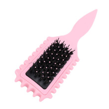 Modelo: Cepillo de peinado con mango de plástico rosa Tamaño: Único