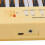 Teclado electrónico de 54 teclas de color amarillo con micrófono con cable. 9