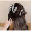 "4 Pack Women's Magic Bun Maker with Pearls and Flowers Ponytail Bun Styler Front" 5