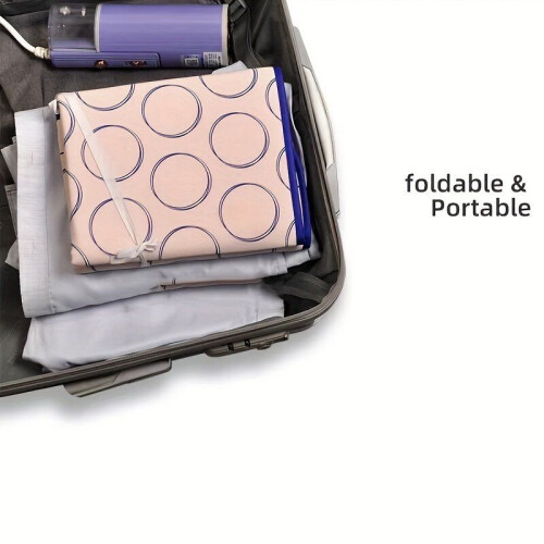 Tapis de repassage clouté avec coussinet en silicone.