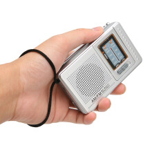 Radio de bolsillo AM/FM gris plateado 10x6x2,5 cm