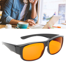Lunettes à verres ambrés et orangés qui bloquent la lumière bleue.