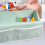 Paraspruzzi per vasca da bagno per bambini con contenitore per giocattoli 5