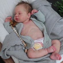 Lifelike newborn baby boy doll, 19 inches, suitable for children to play with.