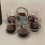 2pcs Foldable Rotating Portable Glass Coffee Cup Plastic Holder 6 Sticks Lifter. 1