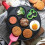 (Red, one-size) Mini Pancake Pan with Handle, 1 Piece 7-grid Smile Face Pattern Non-stick Pancake Pan, Kitchen Cookware for Breakfast Egg 1