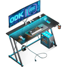 ODK Gaming Desk with LED Lights & Power Outlet, Gaming Table with Cup Holder and Headphone Hook Carbon Fiber Black PC Desk 120 cm