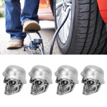 Set di tappi valvola per auto e moto, 4 pezzi, design teschio con casco, anello in gomma, adattamento universale.