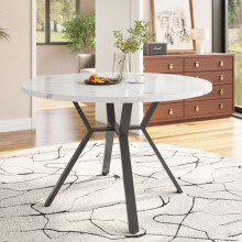 Ronde marmeren eettafel (1 meter in diameter), zwarte salontafel in X-vorm met metalen steun.