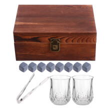 whiskey chilling stones in wood box with tongs and cups
